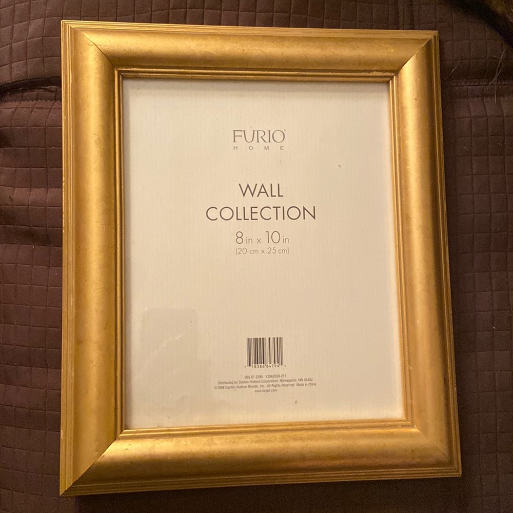 8” X 10” Wooden Gold Frame.  Can be hung or stand